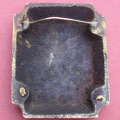 Cast rectangular stud, engraved with initial 'M'